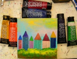 Paint the rooftops with different acrylic colors.